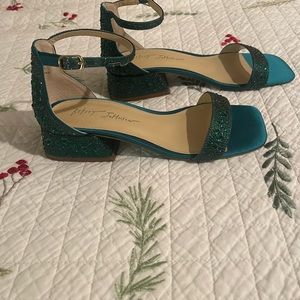 Emerald green block heel sandal.